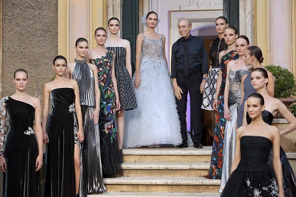 ROME, ITALY - JULY 11: Designer Renato Balestra poses with models at Renato Balestra fashion show as part of AltaRoma AltaModa Fashion Week Fall/Winter 2015/16 at Atelier Balestra on July 11, 2015 in Rome, Italy.  (Photo by Elisabetta A. Villa/Getty Images)